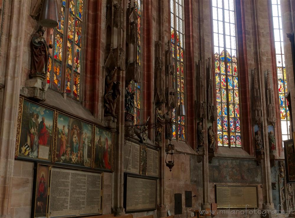 Nürnberg (Germany) - Detail of the interiors of the St. Sebald Church with decorated windows and Tucher-Epitaph